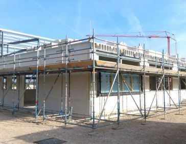 Erection of the walls of the new Spinder building in Drachten. 